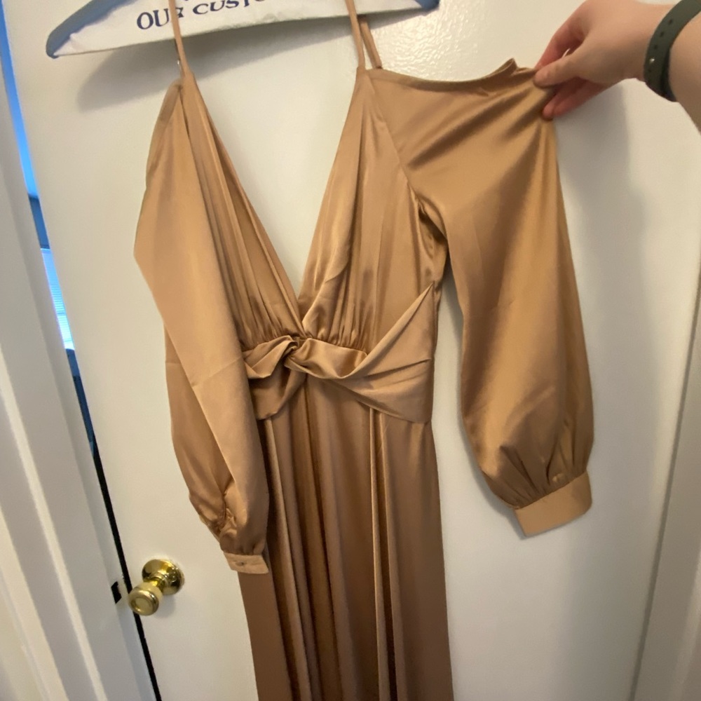 Long sleeve Satin gown with adjustable straps.
